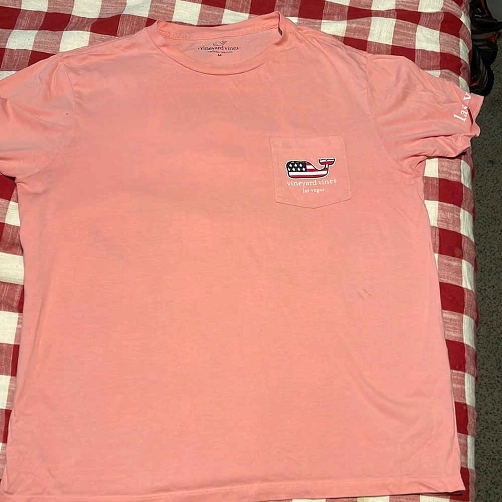 Size medium
Pink  logo design
No stains or issues